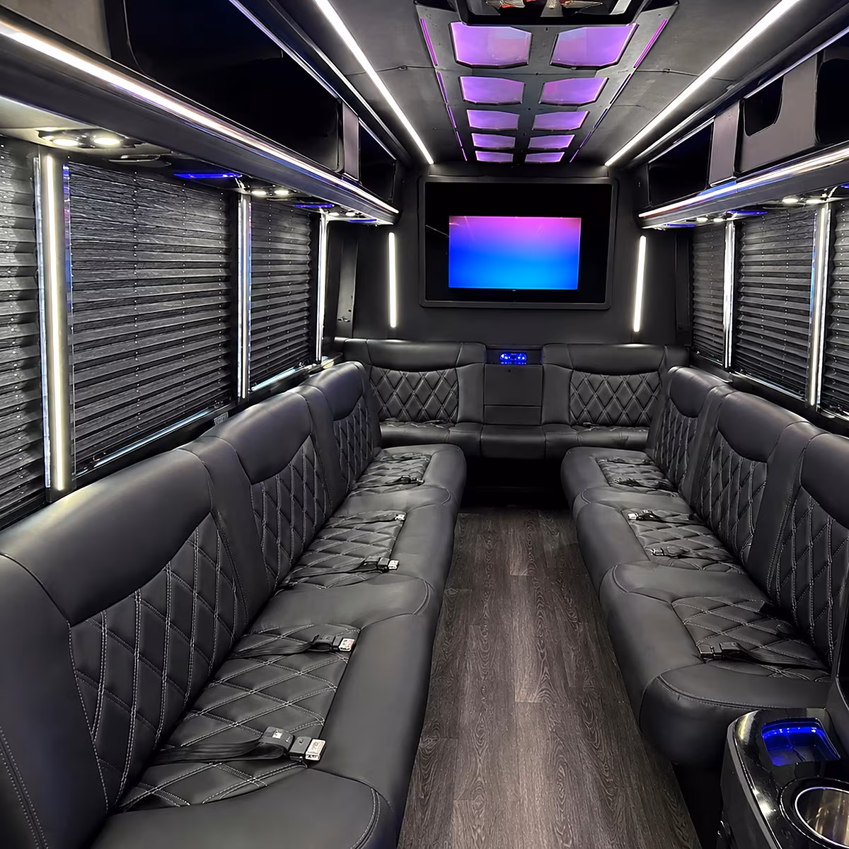 Wedding guests seated inside a party bus serving Chandler